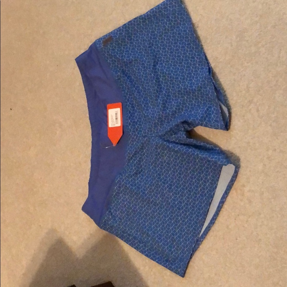 NWT women’s long Roga Shorts